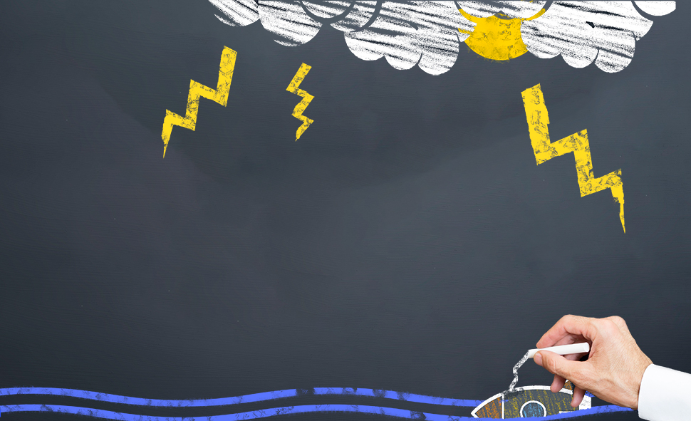 Storm and lightning sketch on chalkboard representing architectural challenges